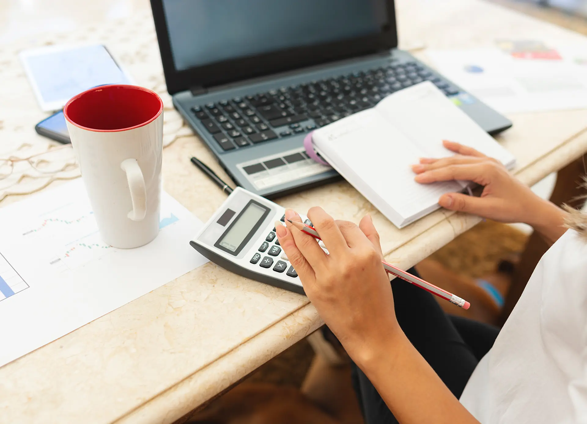 women calculating mortgage